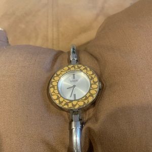 Coach watch with interchangeable bezels